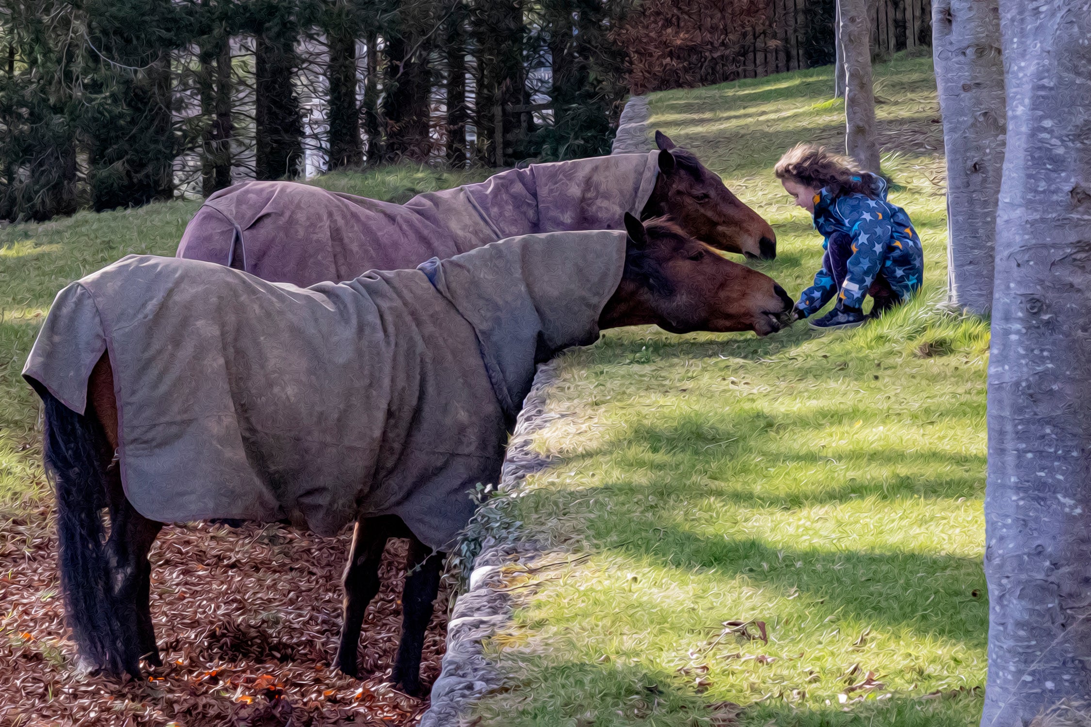 Child Feeding Horses