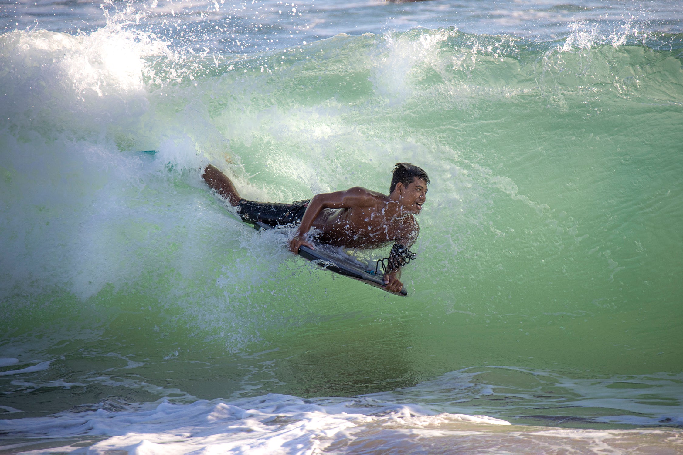 Surfer in the Wave